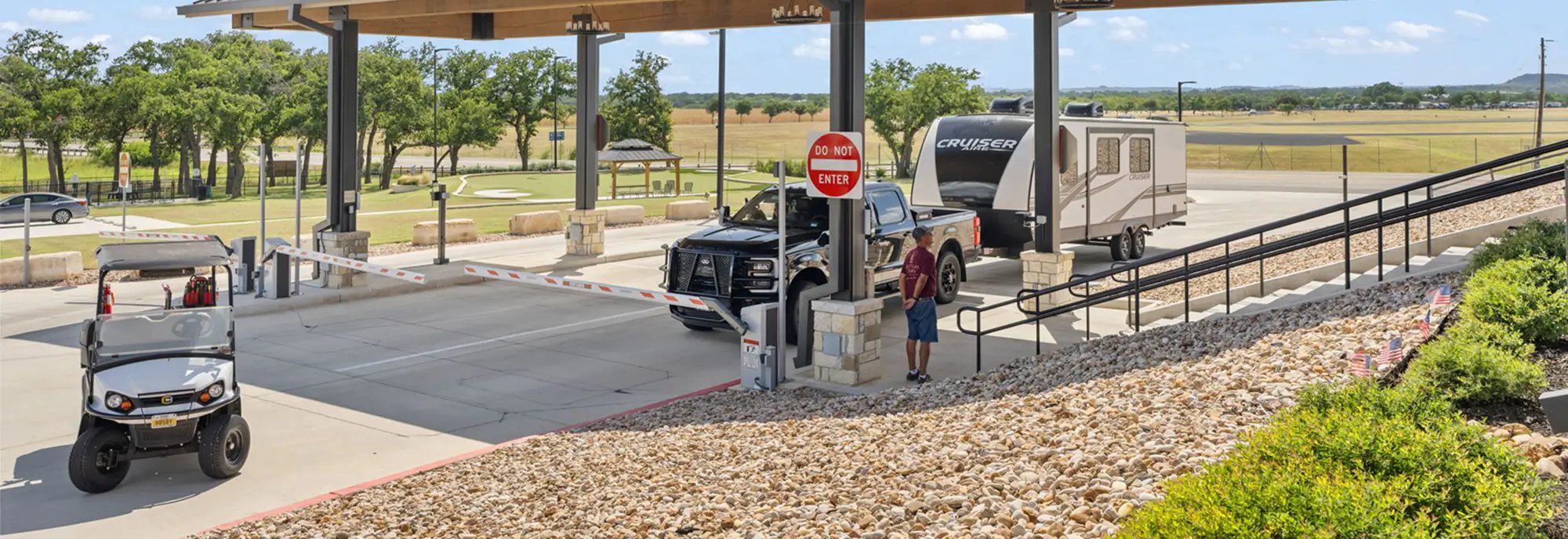 Covered RV sites with a golf cart