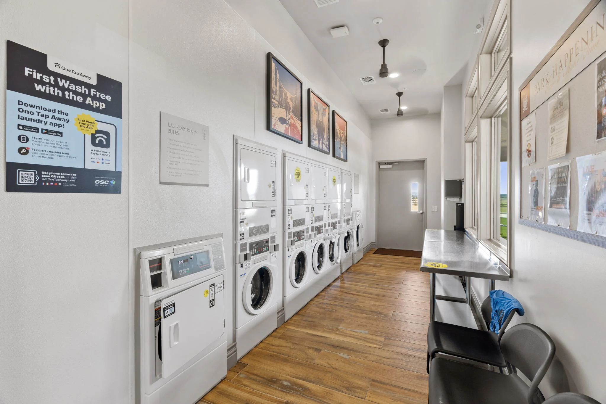Guest laundry room with washers and dryers