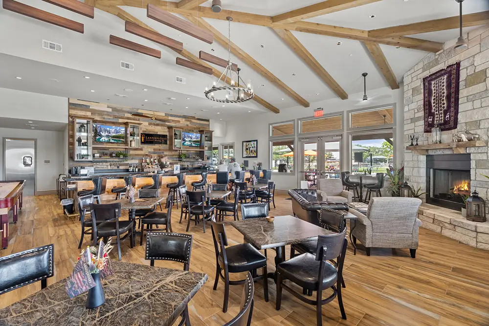 Clubhouse cocktail lounge with seating and a bar