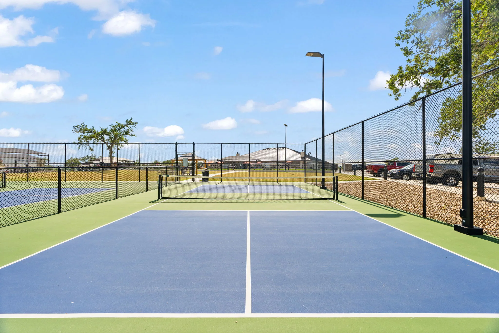 Pickleball court on a sunny day at Lantern Oaks RV Resort