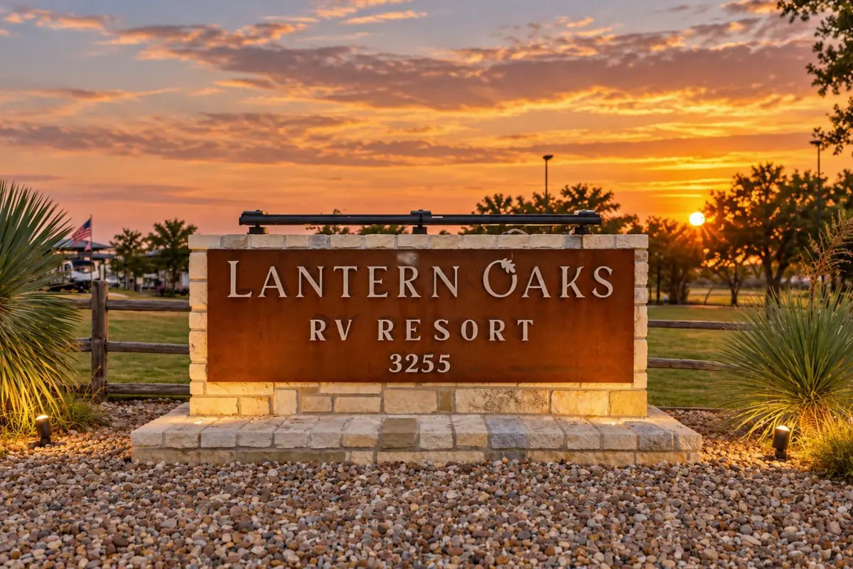Lantern Oaks RV Resort entrance sign at sunset